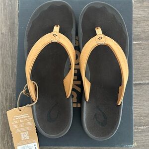 OluKai Black and Tan Sandals